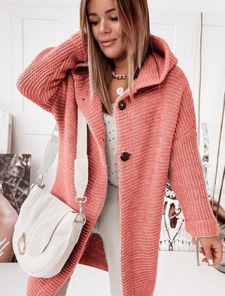 Women's hooded oversized chunky knit cardigan with large buttons in a soft neutral shade