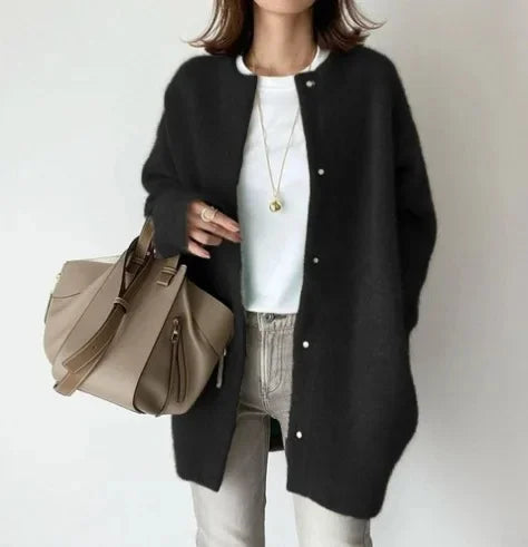 Women's loose fit knitted button-front cardigan jacket with dropped shoulders