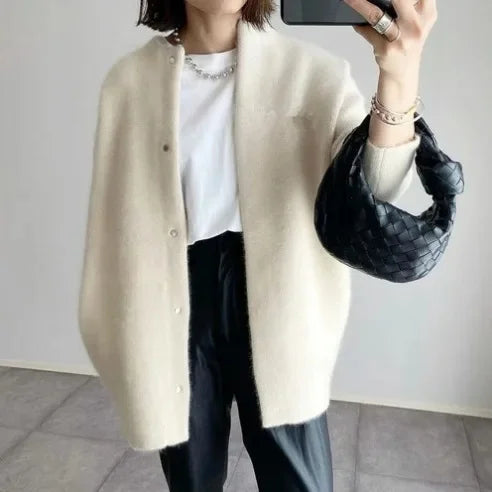 Women's loose fit knitted button-front cardigan jacket with dropped shoulders