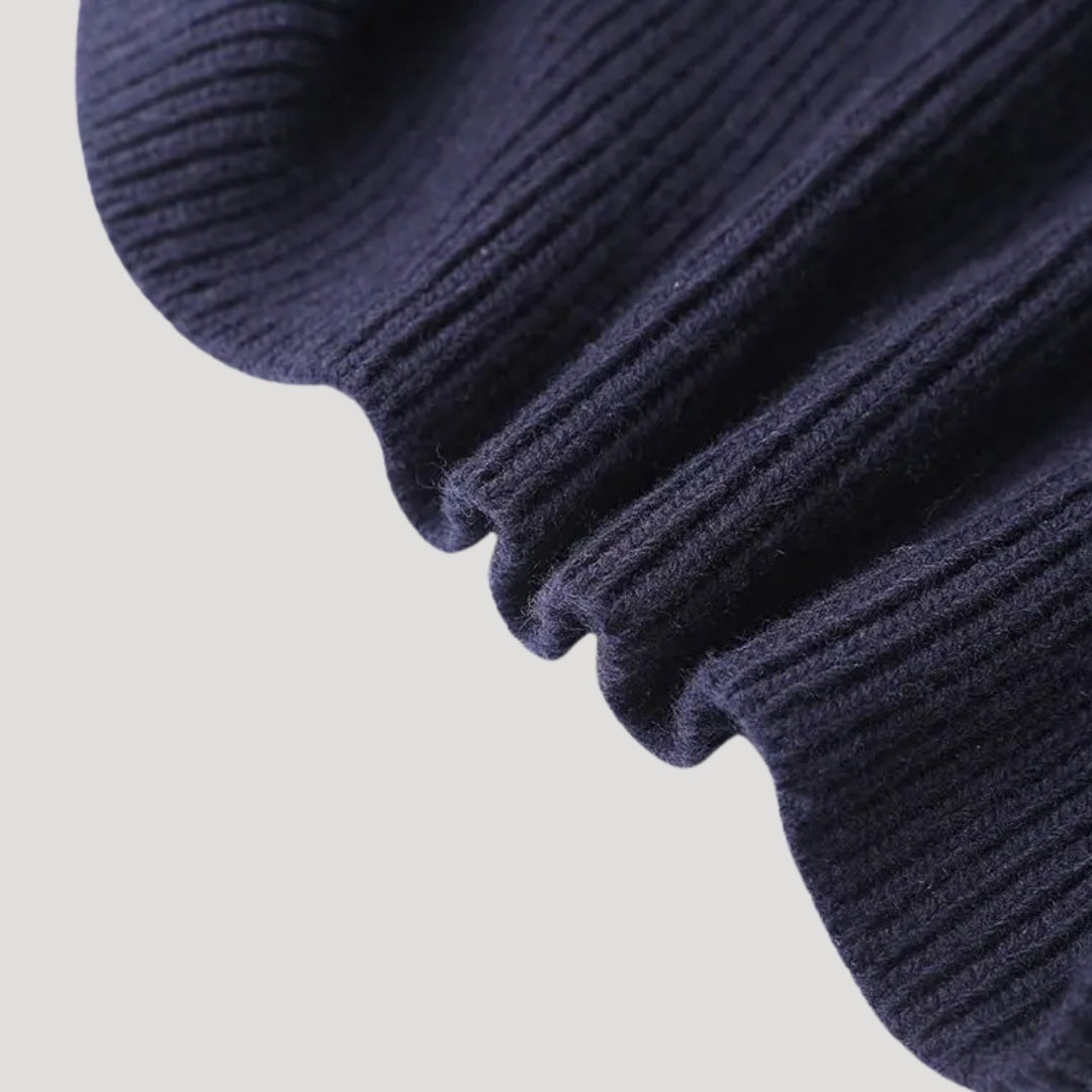 Navy ribbed knit cardigan with contrast denim collar and button placket, slim fit