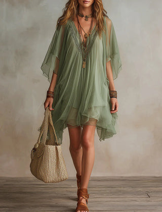 Green layered boho mini dress with tiered floaty silhouette and relaxed fit