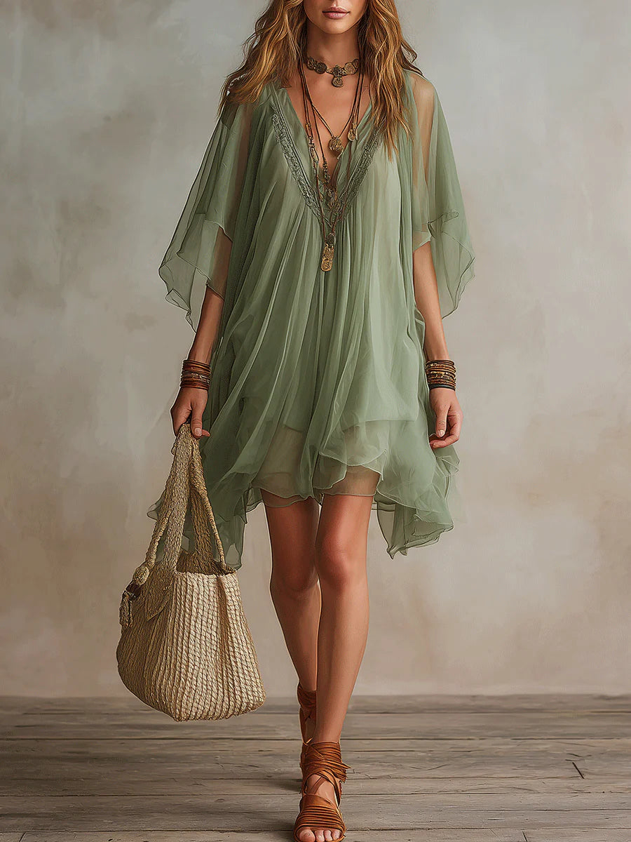 Green layered boho mini dress with tiered floaty silhouette and relaxed fit