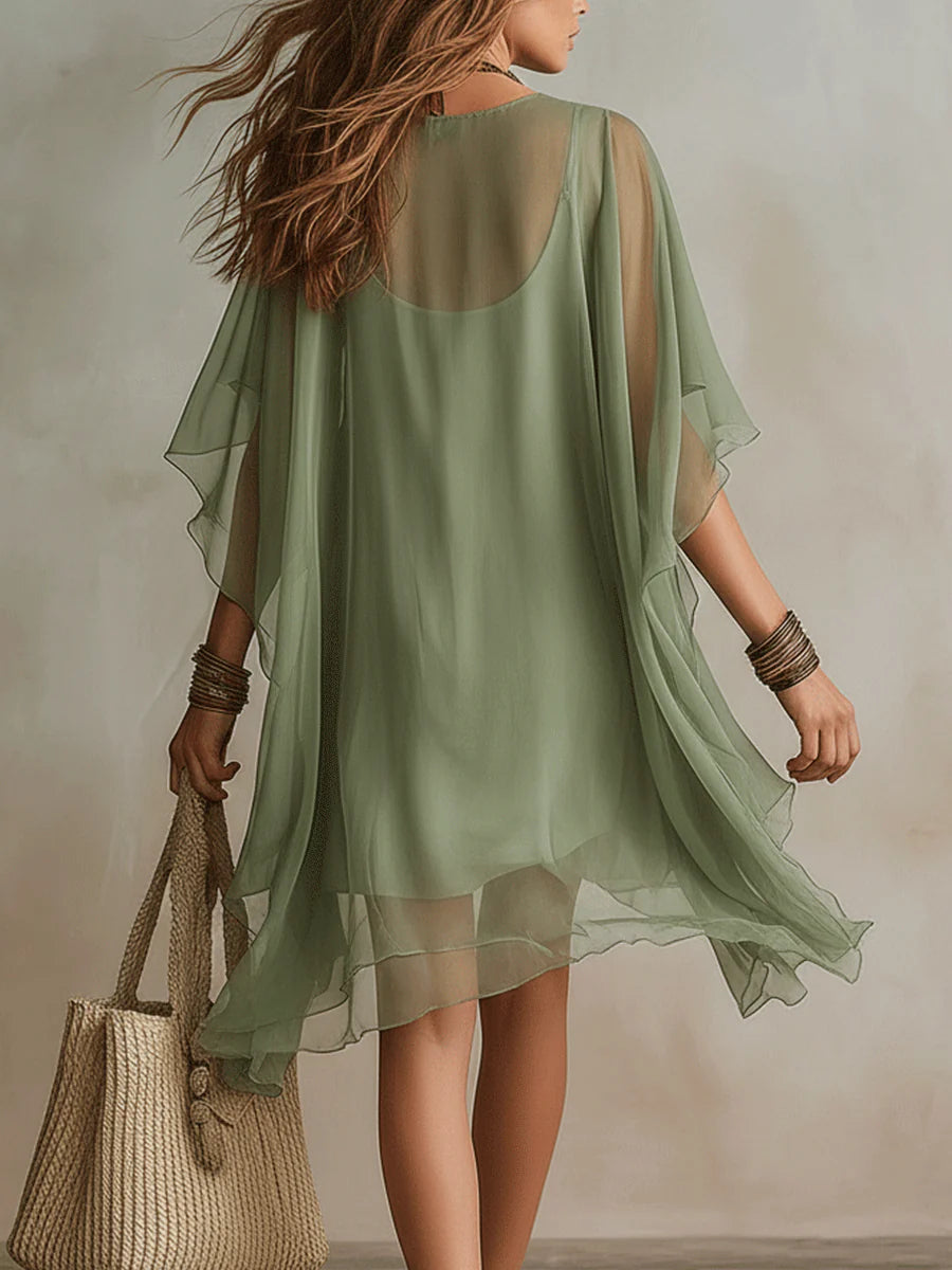 Green layered boho mini dress with tiered floaty silhouette and relaxed fit
