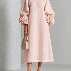 Liliana floral midi dress with round neckline, three-quarter sleeves and rose-knot cuffs
