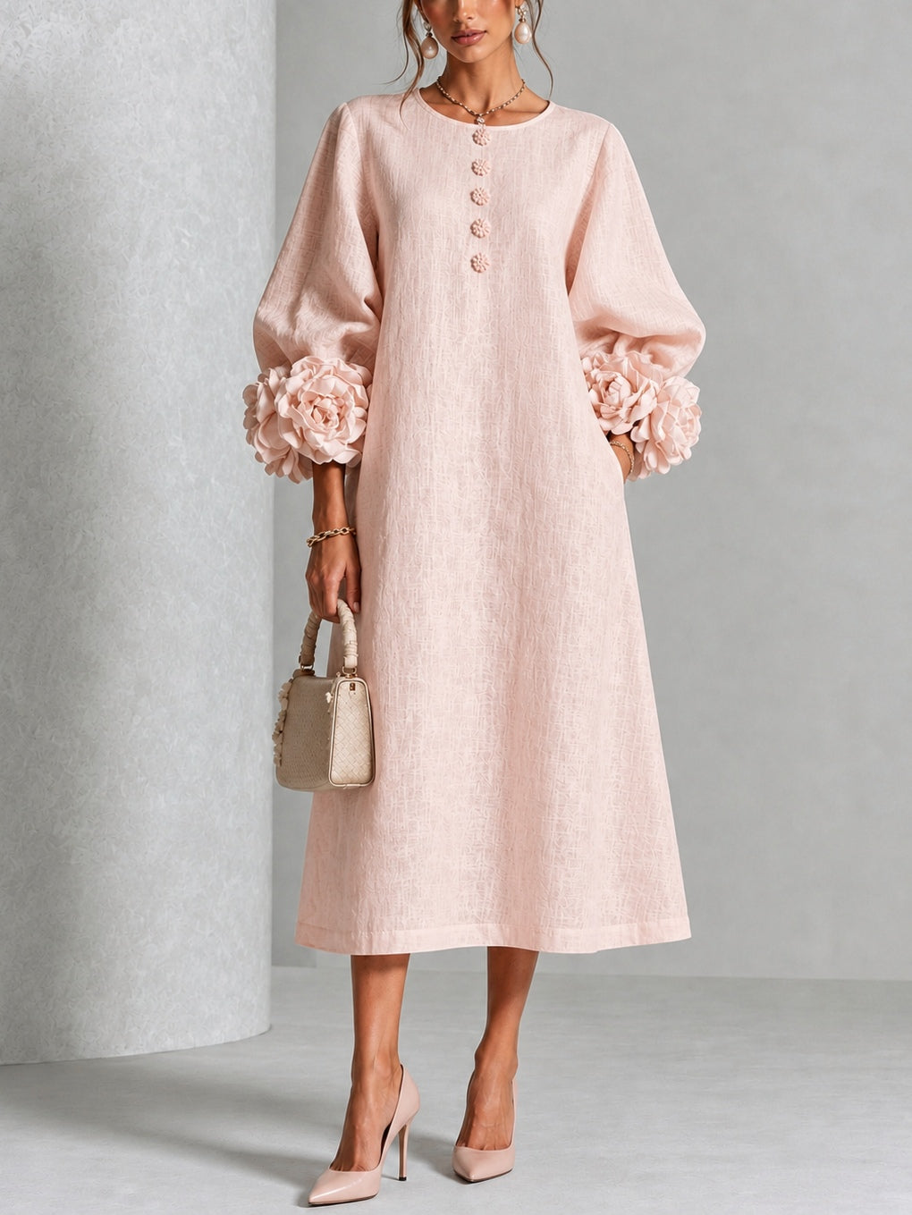 Liliana floral midi dress with round neckline, three-quarter sleeves and rose-knot cuffs