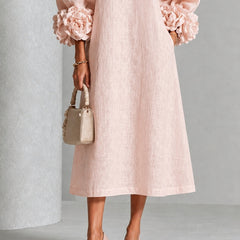 Liliana floral midi dress with round neckline, three-quarter sleeves and rose-knot cuffs