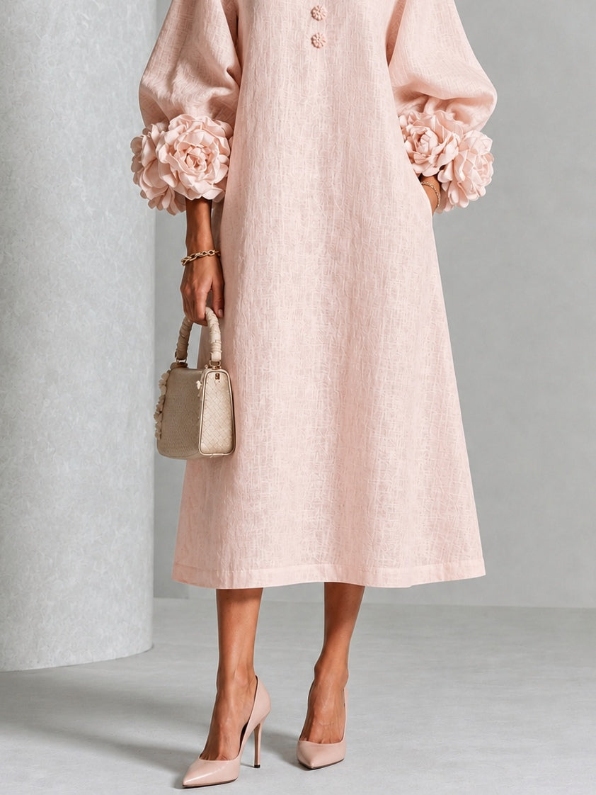 Liliana floral midi dress with round neckline, three-quarter sleeves and rose-knot cuffs