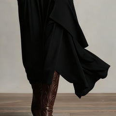 Genevieve turtleneck maxi dress with long sleeves and a soft flowing drape
