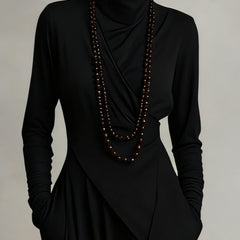 Genevieve turtleneck maxi dress with long sleeves and a soft flowing drape