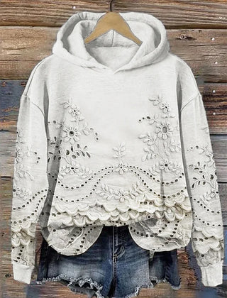 Women's floral eyelet pullover hoodie with structured hood and scalloped hem