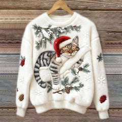 Women's crew neck sweater with a festive cat graphic and winter motifs, long sleeves and ribbed cuffs