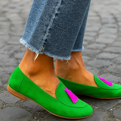 Bright green slip-on loafer with fuchsia tassel detail