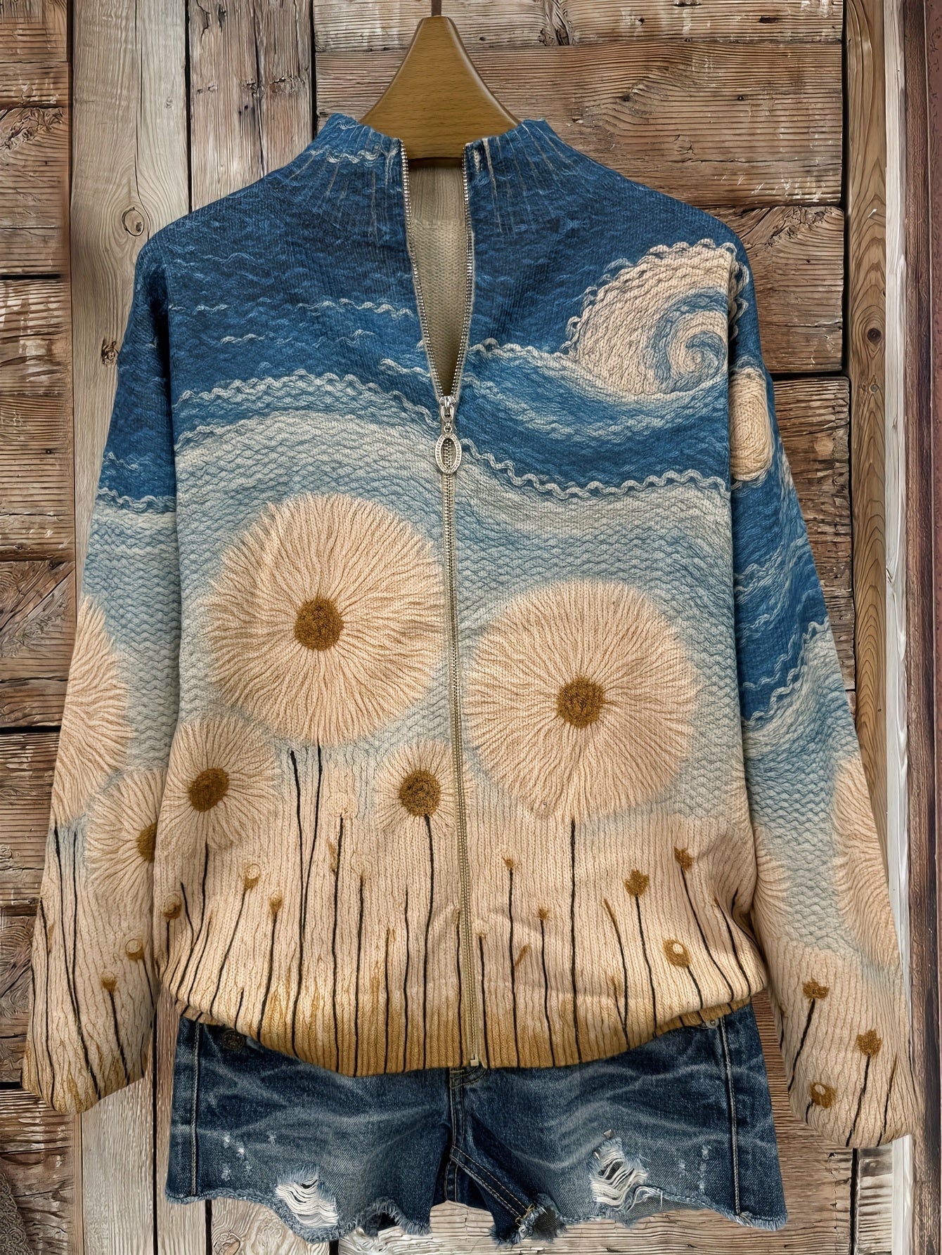 Blue quilted zip cardigan with a sunflower meadow print and ribbed cuffs and hem
