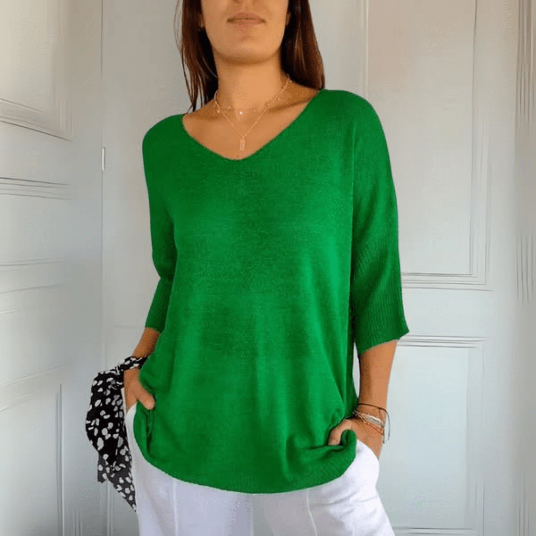Women's V-neck sweater with a loose, relaxed silhouette shown in multiple colours