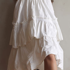 Boho corset midi dress with tiered skirt and delicate lace trim at the neckline