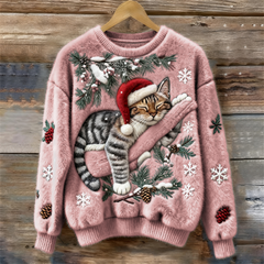 Women's crew neck sweater with a festive cat graphic and winter motifs, long sleeves and ribbed cuffs