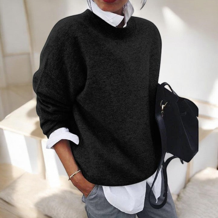 Women's solid single-tone round neck pullover sweater with long sleeves and straight hem