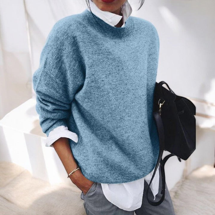 Women's solid single-tone round neck pullover sweater with long sleeves and straight hem