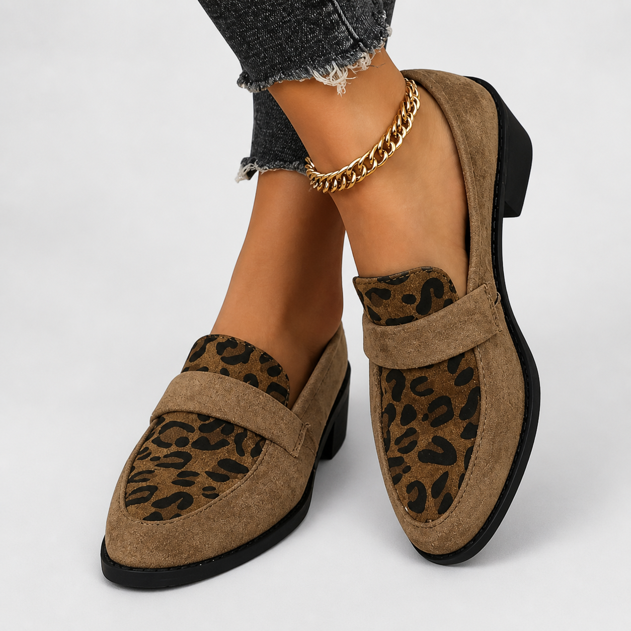 Brunika slip-on loafers in brown, grey and black with a refined, structured design