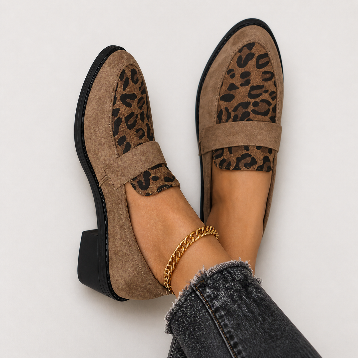 Brunika slip-on loafers in brown, grey and black with a refined, structured design