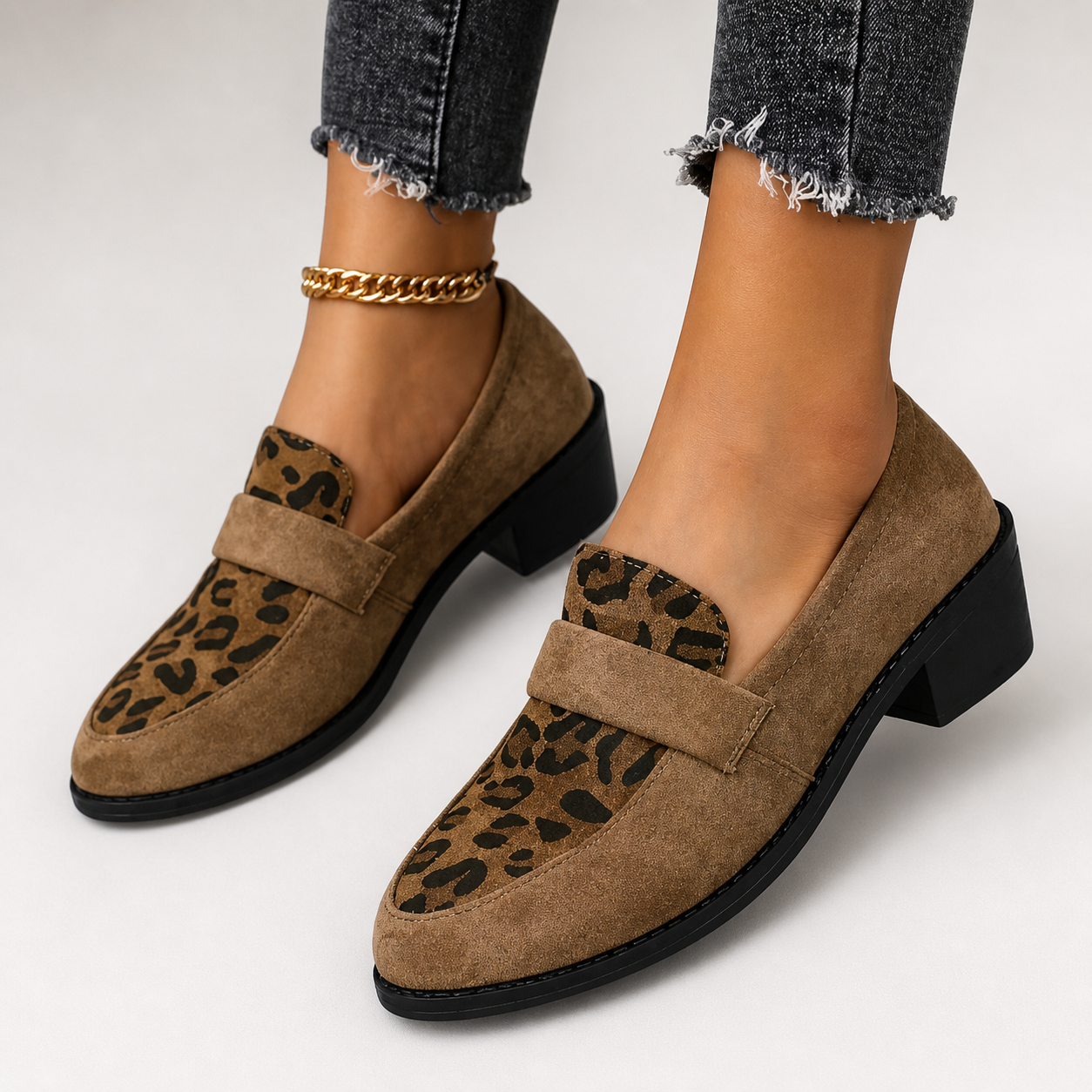 Brunika slip-on loafers in brown, grey and black with a refined, structured design