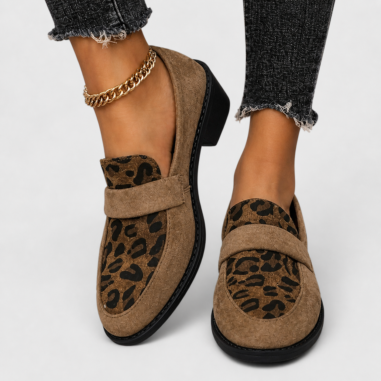 Brunika slip-on loafers in brown, grey and black with a refined, structured design