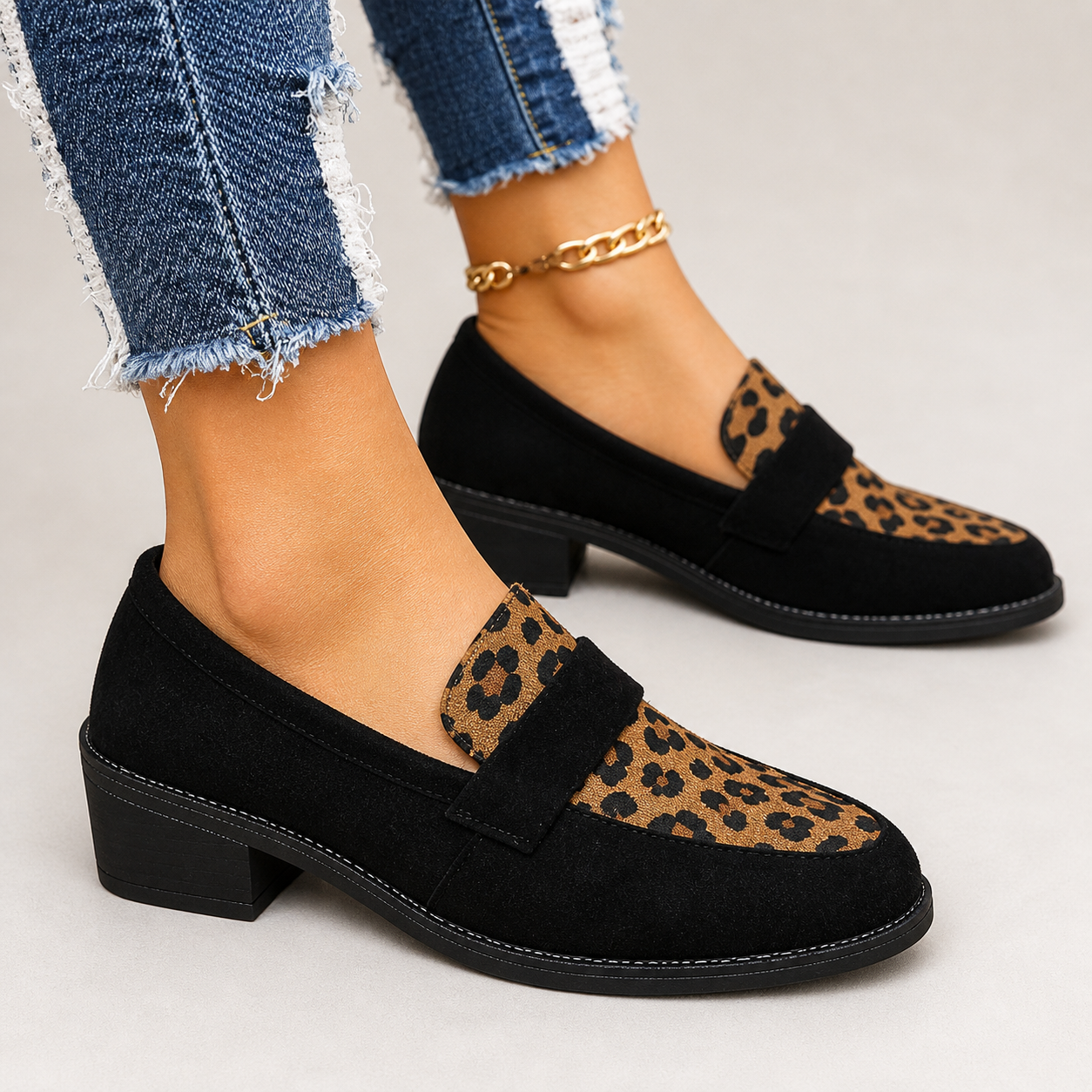 Brunika slip-on loafers in brown, grey and black with a refined, structured design
