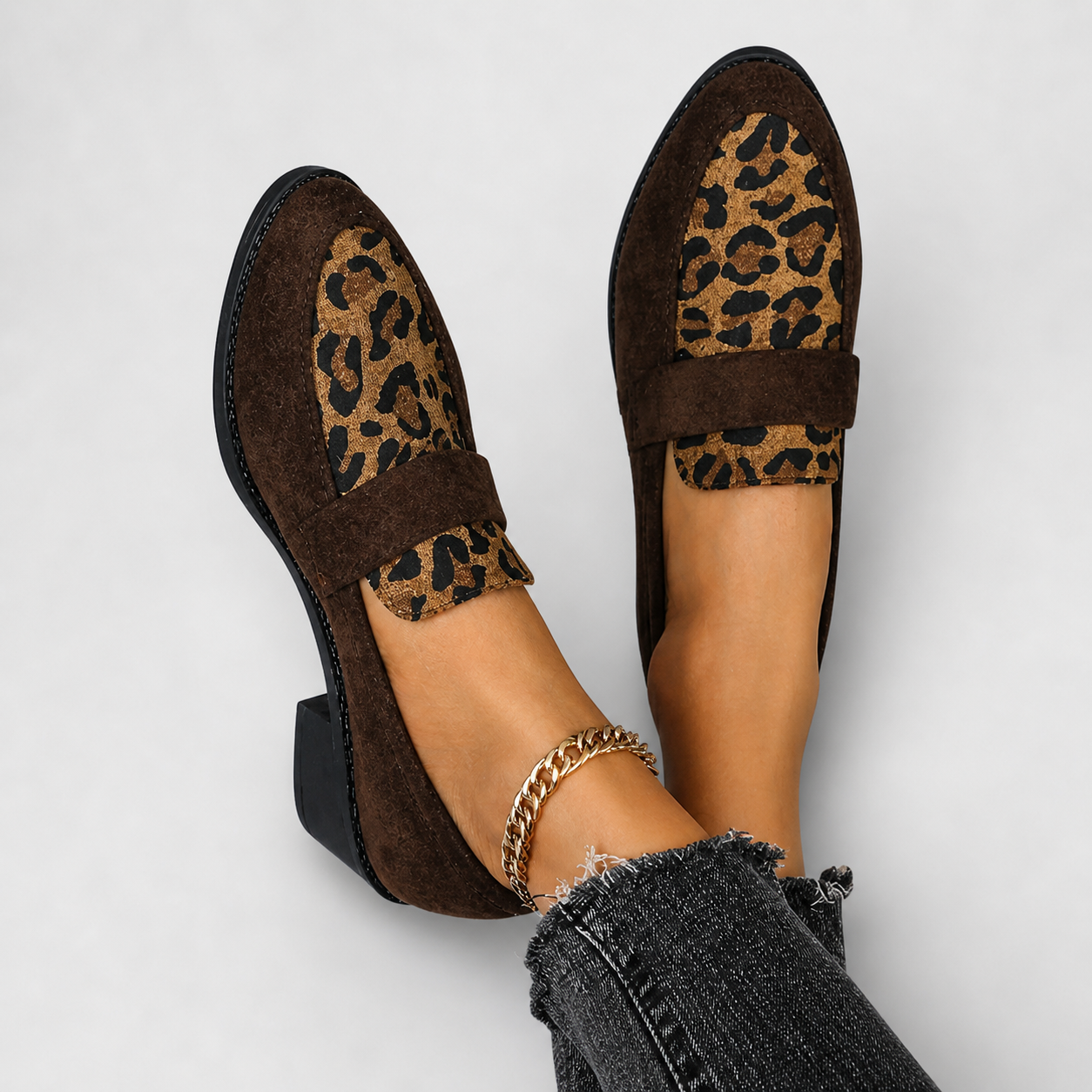 Brunika slip-on loafers in brown, grey and black with a refined, structured design