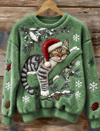 Women's crew neck sweater with a festive cat graphic and winter motifs, long sleeves and ribbed cuffs