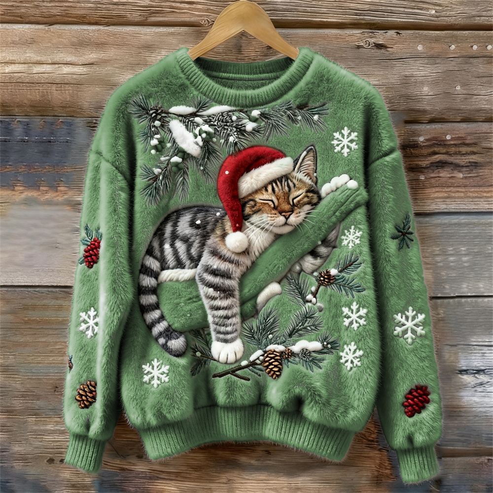Women's crew neck sweater with a festive cat graphic and winter motifs, long sleeves and ribbed cuffs