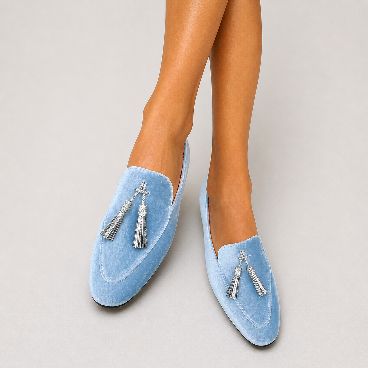 Chic blue slip-on loafers for women with refined detailing