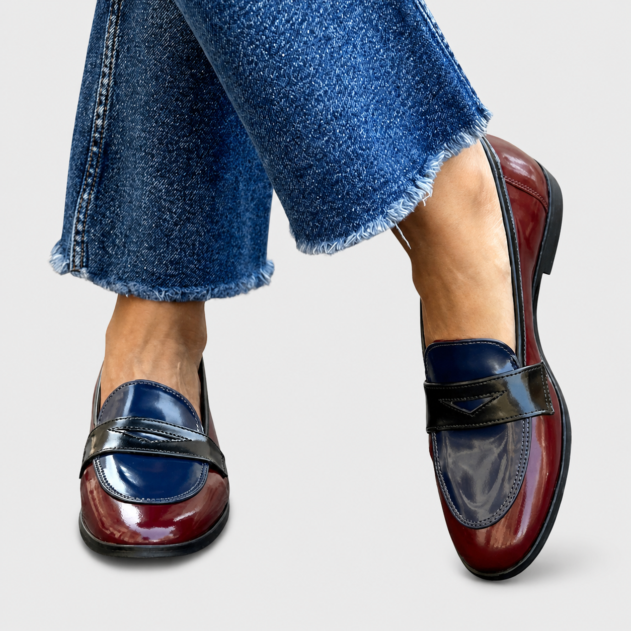 Two-tone loafers with a refined structured design and subtle finish