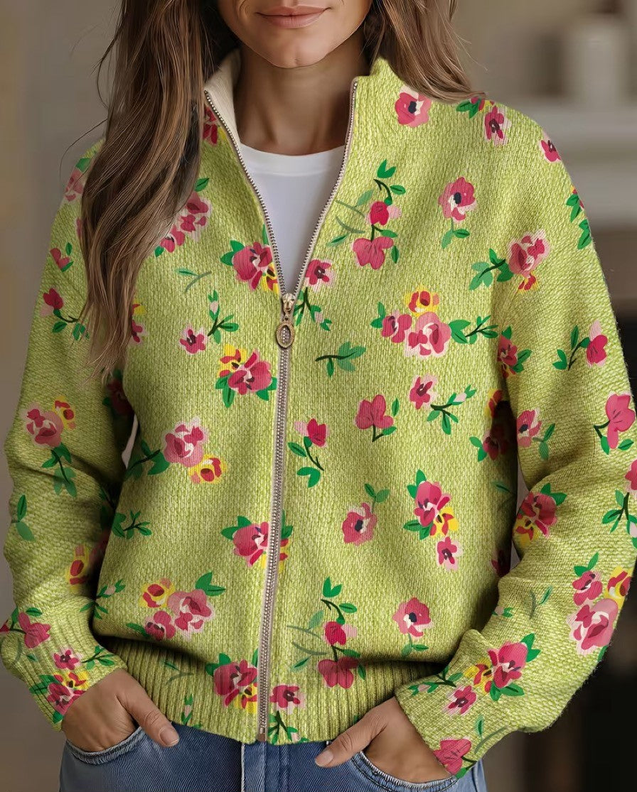 Lime green zip-up bomber cardigan with pink and coral floral print and metal zipper pull