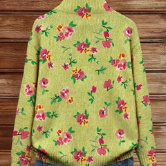Lime green zip-up bomber cardigan with pink and coral floral print and metal zipper pull