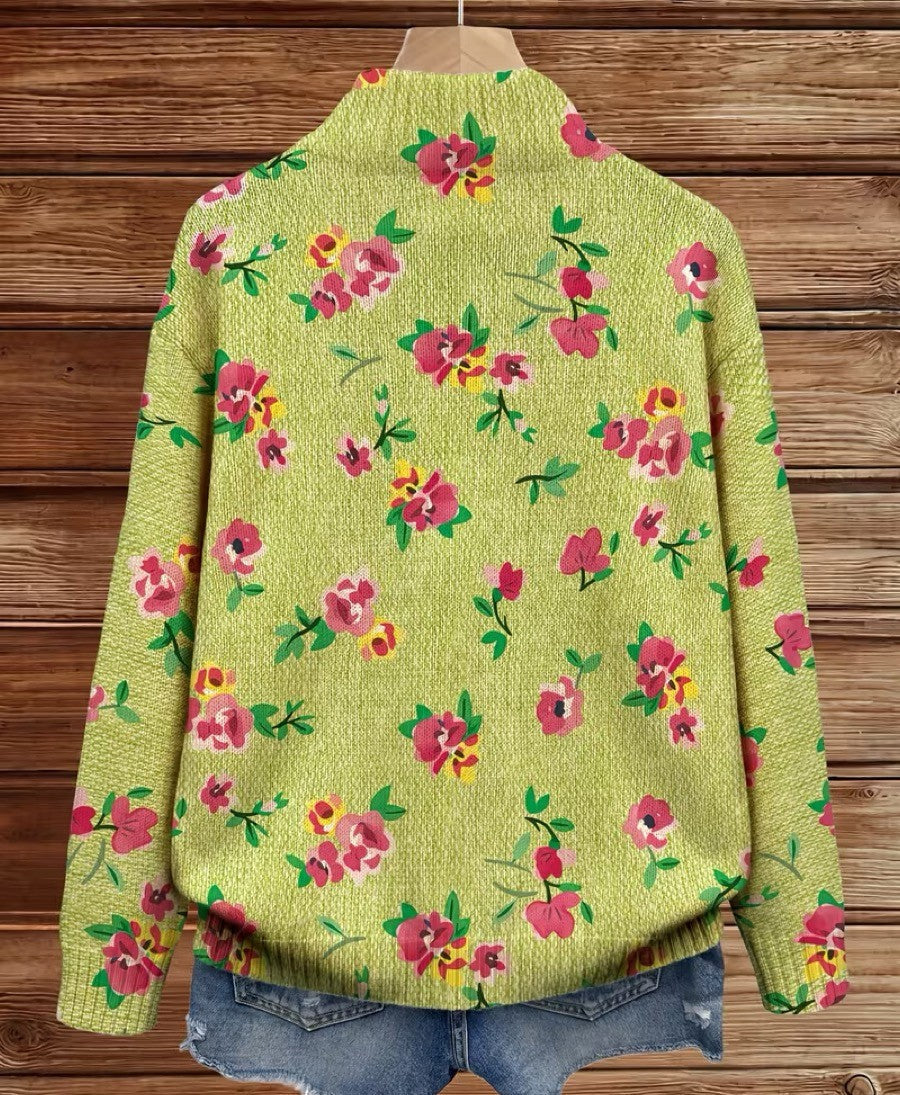 Lime green zip-up bomber cardigan with pink and coral floral print and metal zipper pull