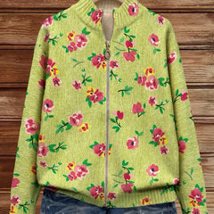 Lime green zip-up bomber cardigan with pink and coral floral print and metal zipper pull