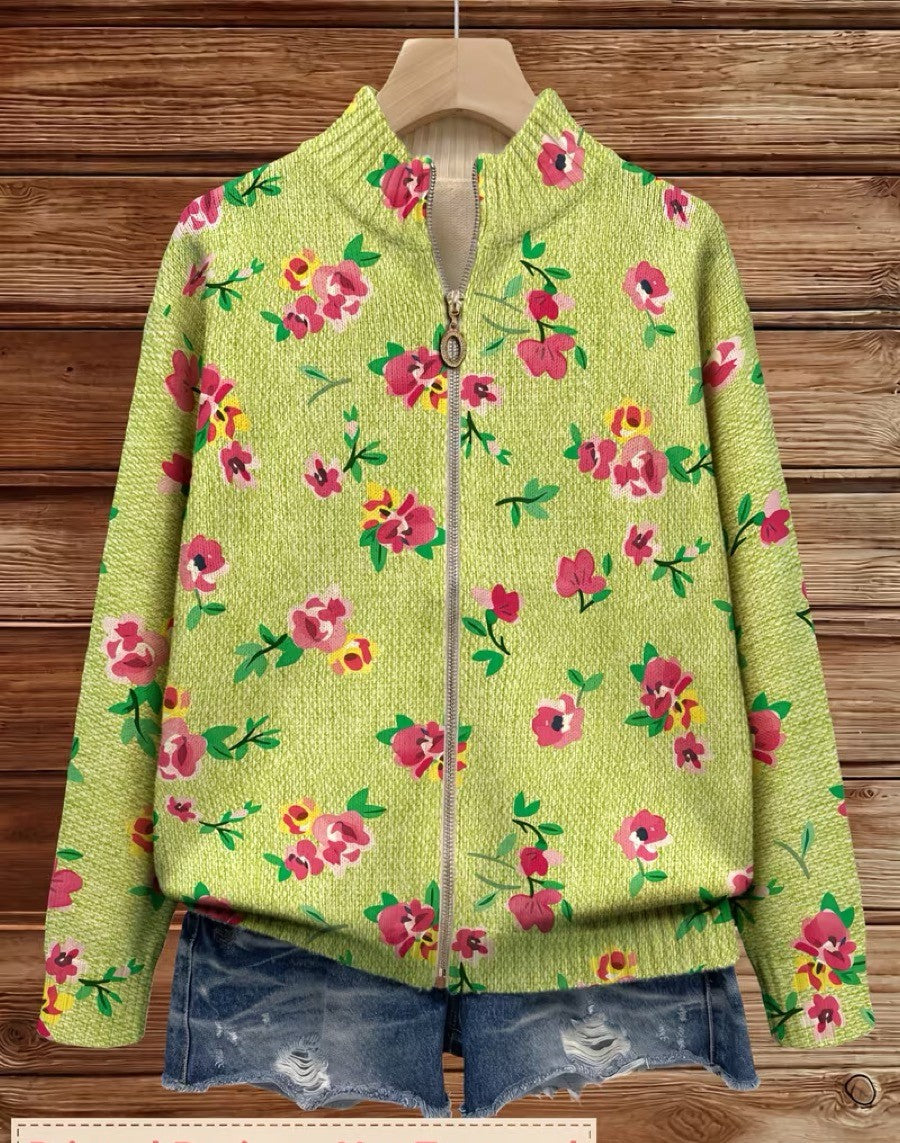 Lime green zip-up bomber cardigan with pink and coral floral print and metal zipper pull