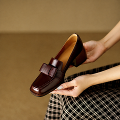 Contessa buckle loafers with square toe and block heel in black and brown