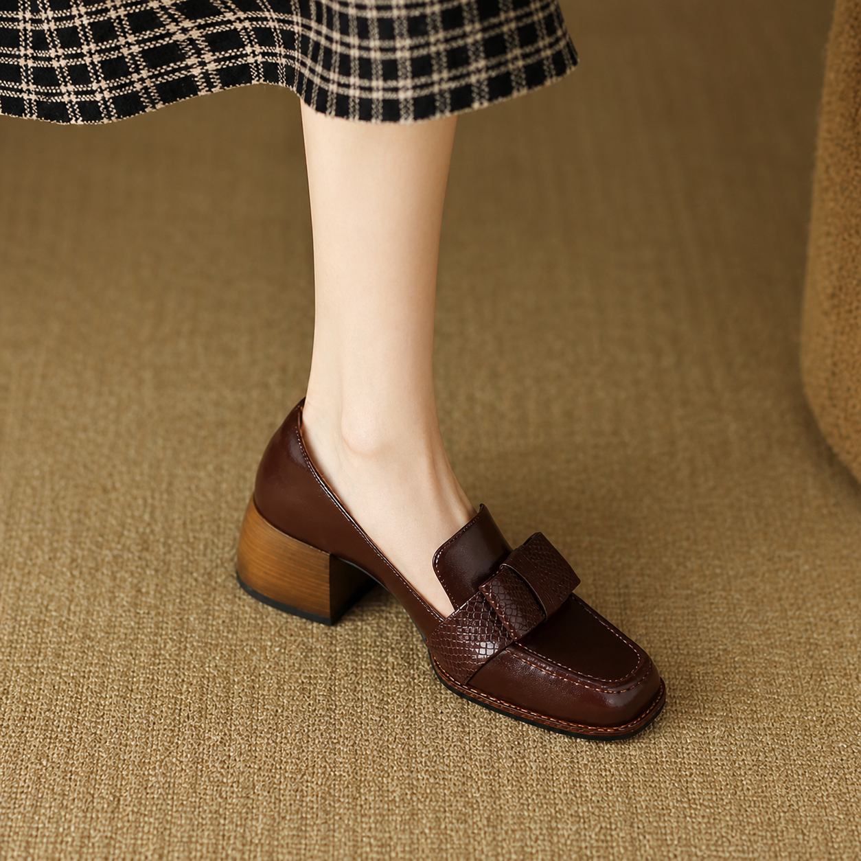 Contessa buckle loafers with square toe and block heel in black and brown