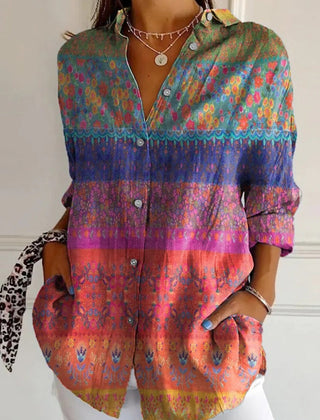 Woman's loose floral button-up long sleeve tunic blouse with shirt collar in multicolor