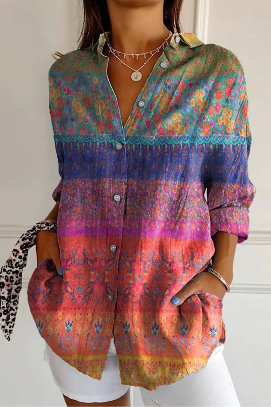 Woman's loose floral button-up long sleeve tunic blouse with shirt collar in multicolor