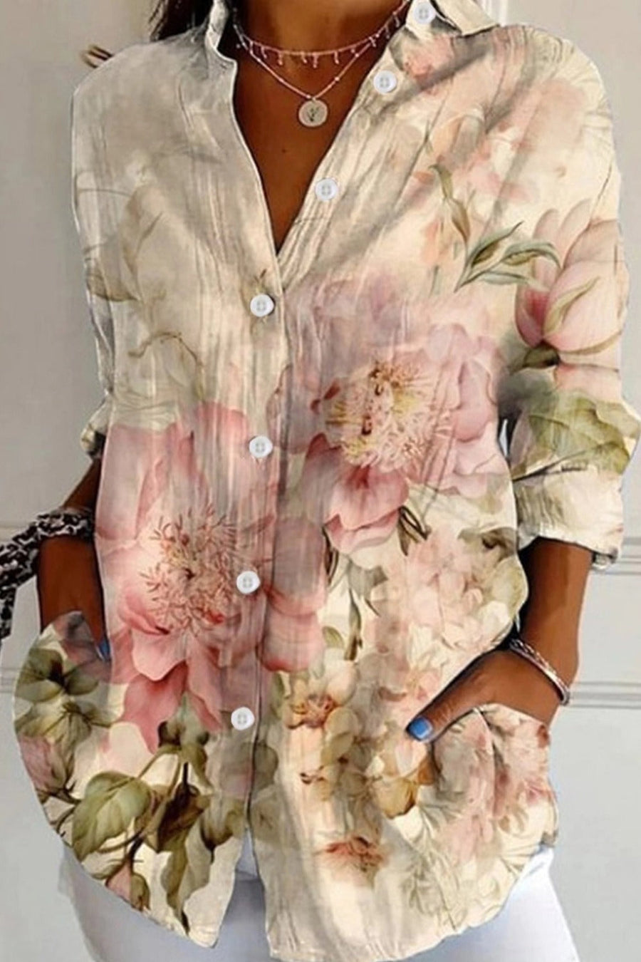 Womens floral long sleeve button-up tunic shirt with classic collar in a loose fit