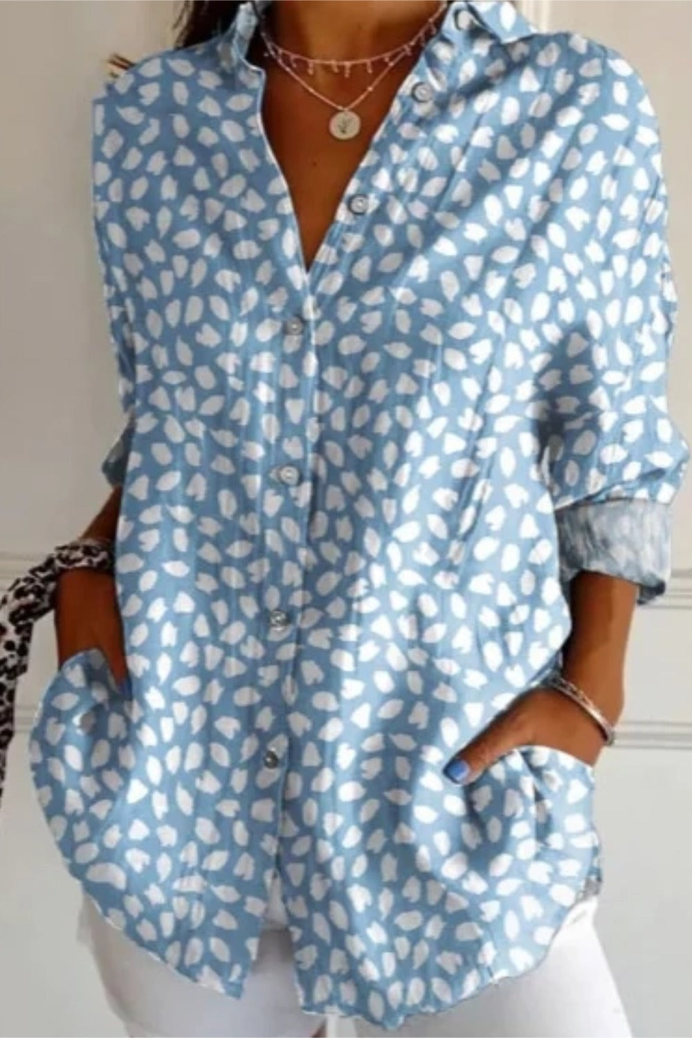 Floral print long sleeve button-up tunic blouse with shirt collar in a loose fit