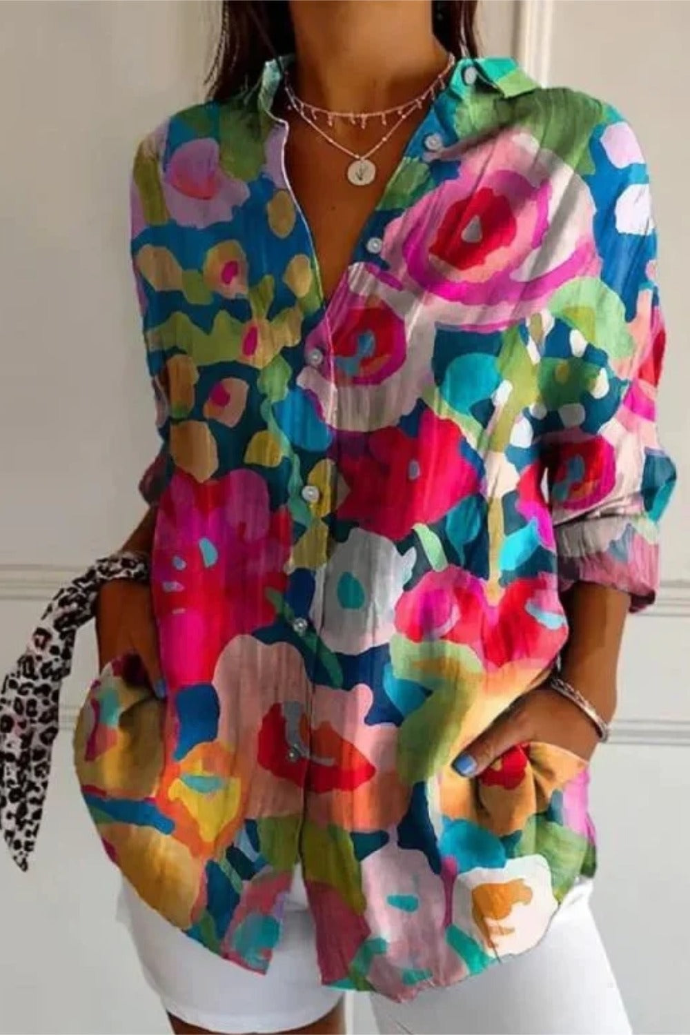 Multicolor floral button-up long sleeve tunic blouse with shirt collar in a loose fit