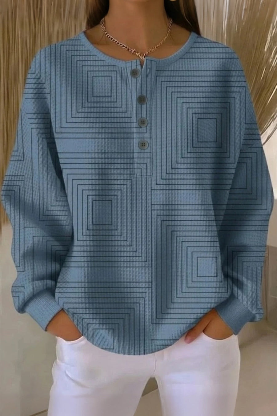 Casual henley collar sweatshirt with geometric print in a relaxed fit