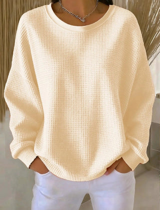 Women's plain crew neck waffle-textured sweatshirt in a relaxed casual fit