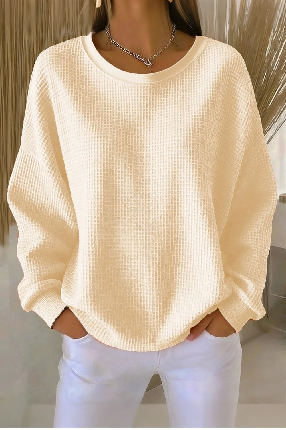Women's plain crew neck waffle-textured sweatshirt in a relaxed casual fit