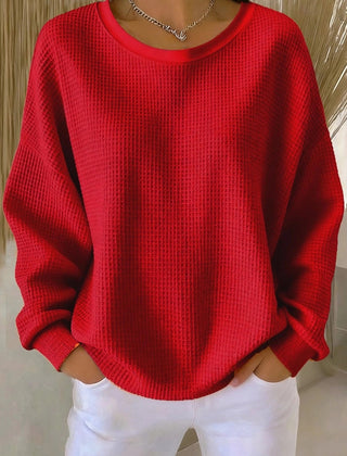 Women's plain crew neck waffle-textured sweatshirt in a relaxed casual fit