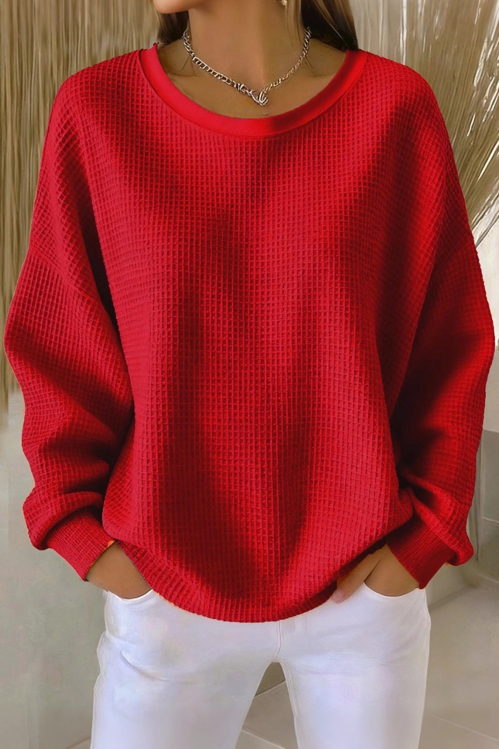 Women's plain crew neck waffle-textured sweatshirt in a relaxed casual fit