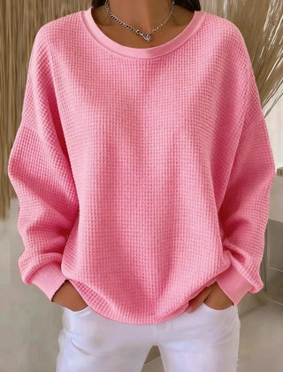 Women's plain crew neck waffle-textured sweatshirt in a relaxed casual fit
